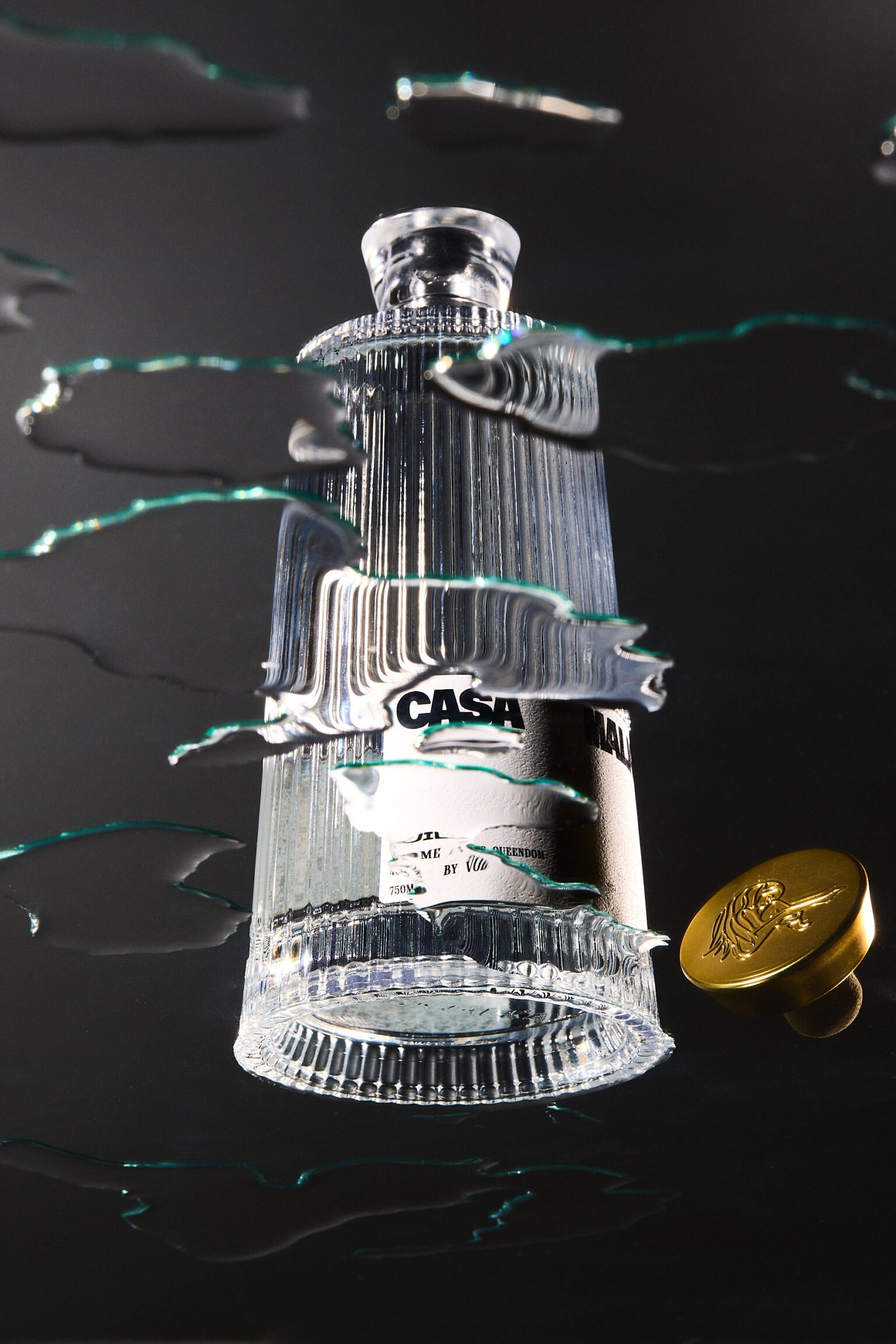 Casa Malka Blanco Tequila bottle with reflective glass design and gold cap